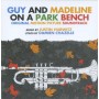 GUY AND MADELINE ON A PARK BENCH